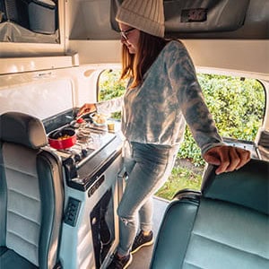 Jucy Condo Campervan – 4 Berth-makling_tea_with_boot_open