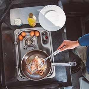 Jucy Condo Campervan – 4 Berth_cooking_breakfast_POV