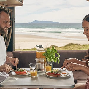 maui-ultima-2-berth-motorhome-interior-couple-eating