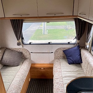 RCC BI Motorhome – 6 Berth-couch-convertible-to-bed