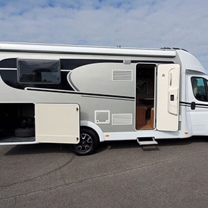 kwm-luxury-motorhome-4-berth-side-view-with-doors-open