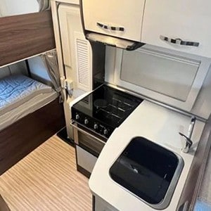 rcc-td-motorhome-6-berth-interior-kitchen-and-beds